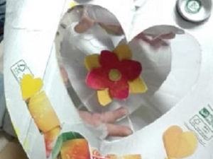 O Trabalho final, verso do coração amarelo para a mãe, o sorriso doce da mãe para a MÃE NATUREZA